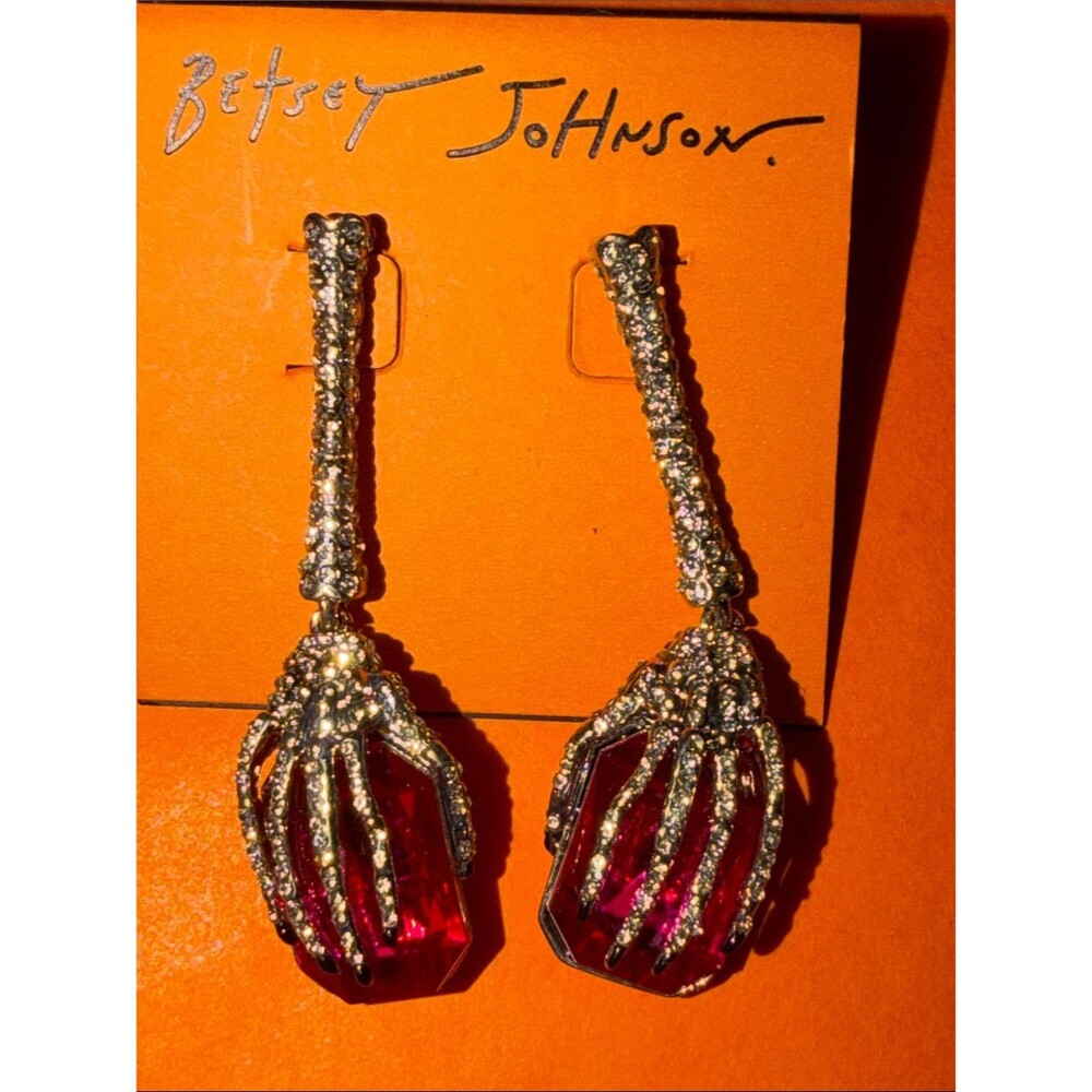 NWT Betsey Johnson rhinestone  jointed skeleton arms earrings W/pink gem.